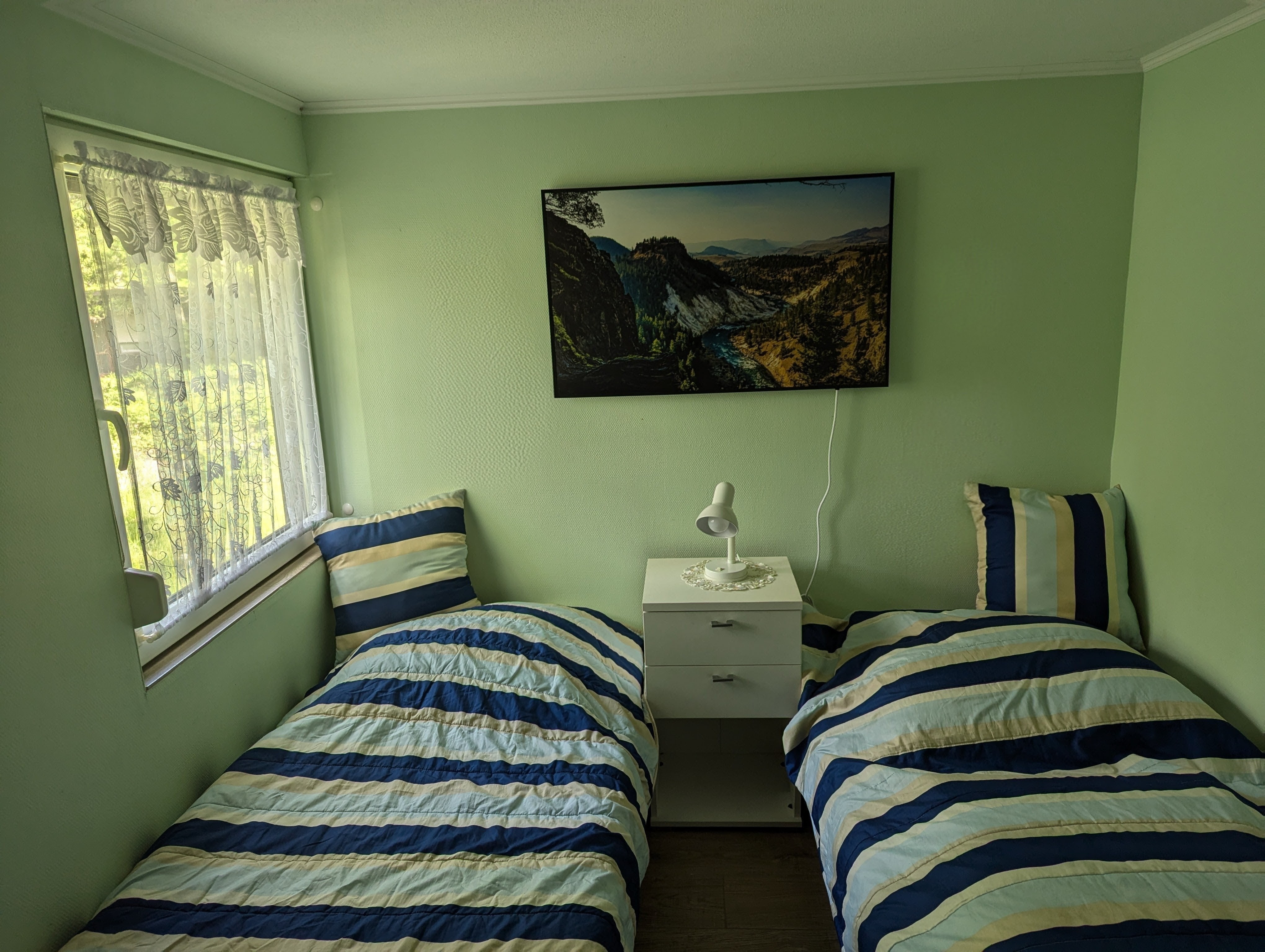 Waldnest – Kinderzimmer mit zwei Einzelbetten