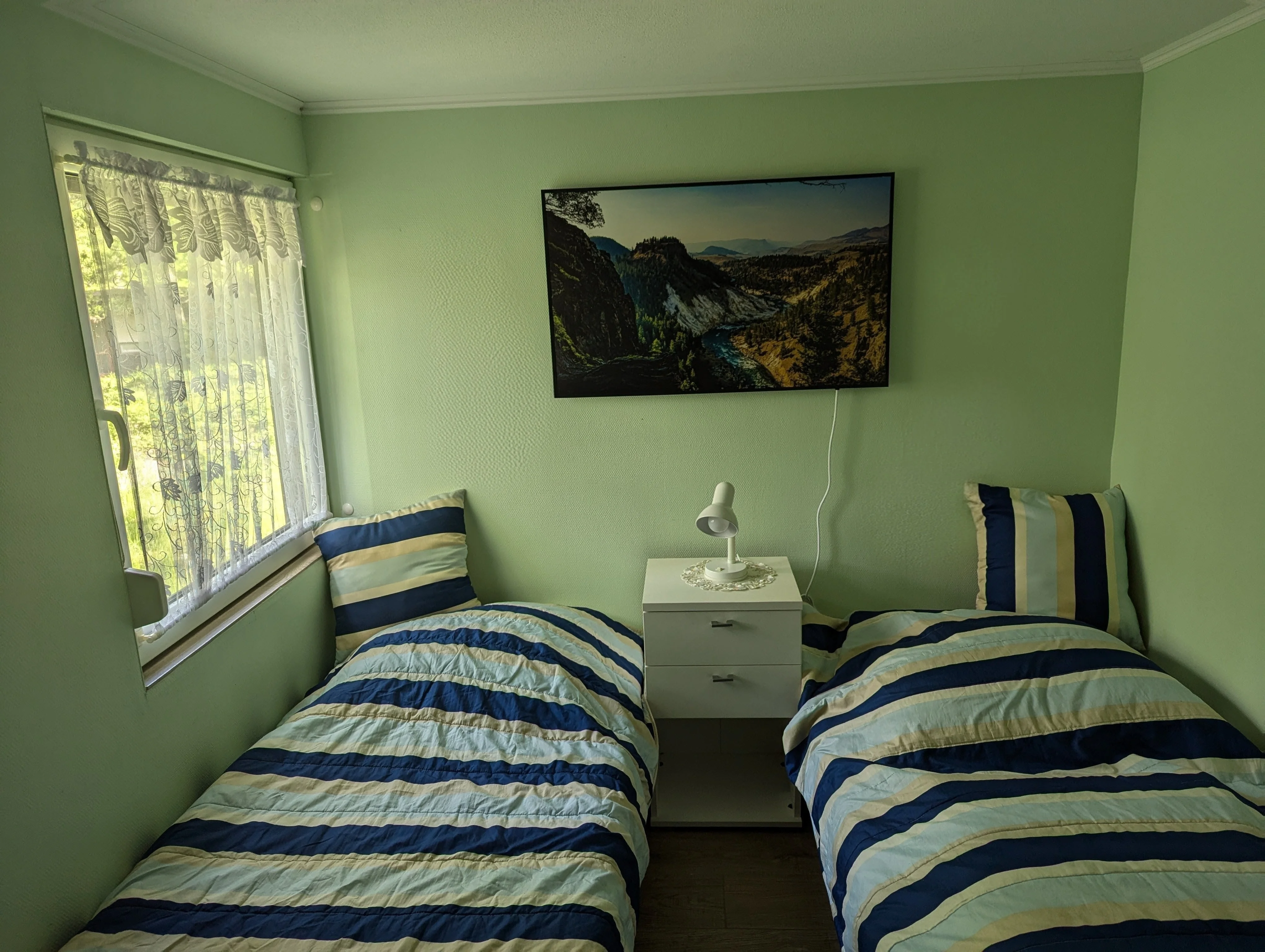 Waldnest – Kinderzimmer mit zwei Einzelbetten